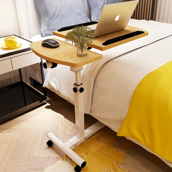 High quality notebook computer table bed for learning household lifting and folding movable bedside table.
High quality notebook computer table bed for learning household lifting and folding movable bedside table.
