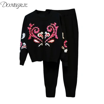 2019 autumn and winter new women's European station heavy work beaded long-sleeved loose sweater sweater feet pants suit
2019 autumn and winter new women's European station heavy work beaded long-sleeved loose sweater sweater feet pants suit