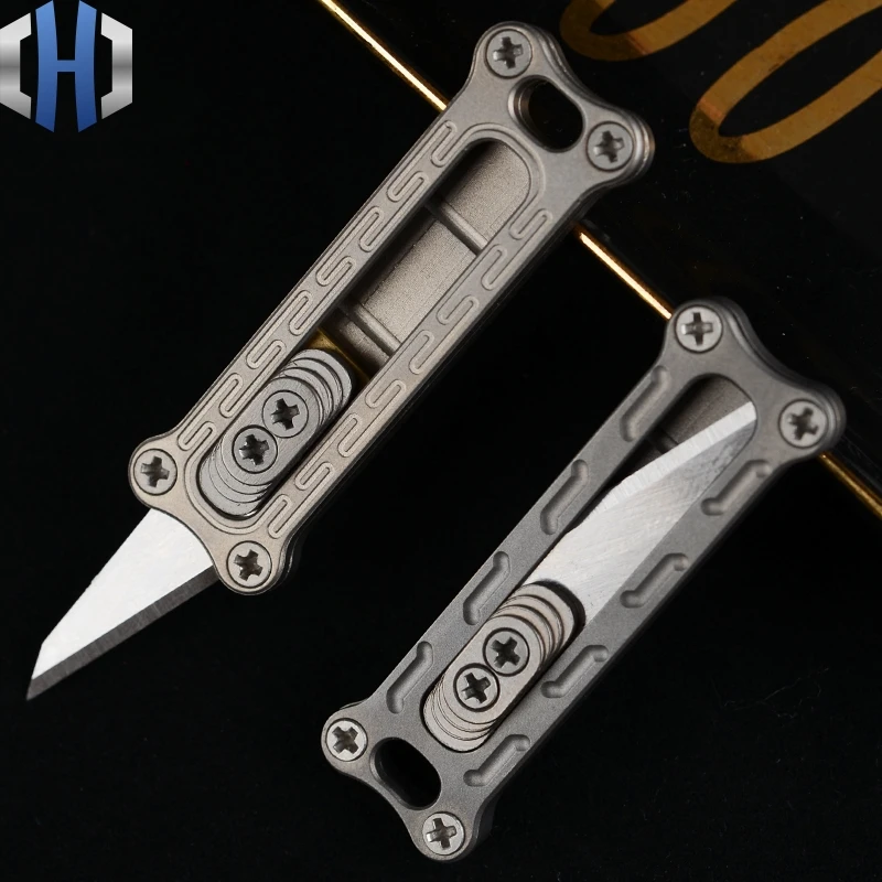 Titanium Mini Utility Knife EDC Portable Tool Paper Cutter Hangable Keychain Customizable
Titanium Mini Utility Knife EDC Portable Tool Paper Cutter Hangable Keychain Customizable