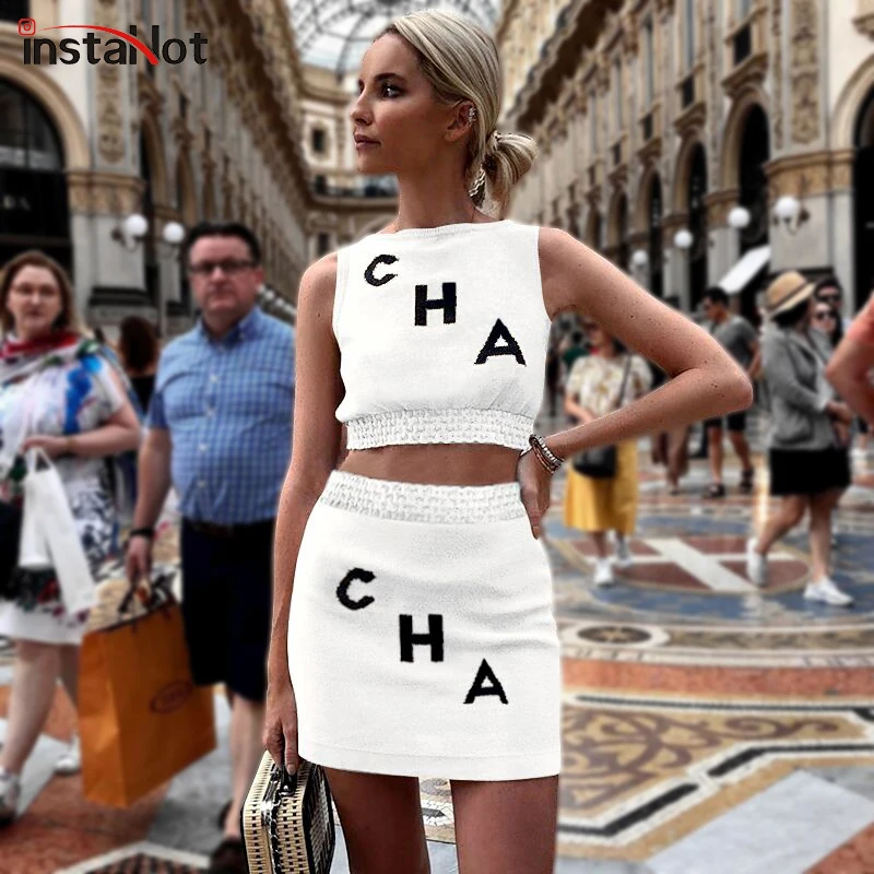 InstaHot Sexy Letter Print Crop Top And Short Skirts Ribbed Knitted Tank Top Two Piece Sets Women Pencil Skirts 2019 Summer
InstaHot Sexy Letter Print Crop Top And Short Skirts Ribbed Knitted Tank Top Two Piece Sets Women Pencil Skirts 2019 Summer