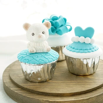 Blue artificial cup cake Beautiful wedding props Creative birthday souvenir on photography background
Blue artificial cup cake Beautiful wedding props Creative birthday souvenir on photography background
