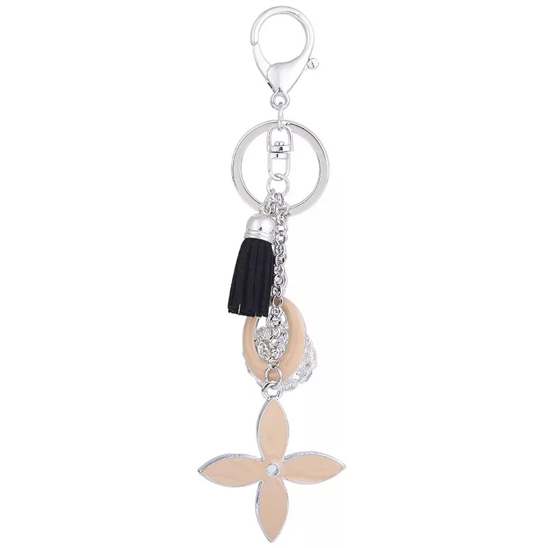 Creative simple four-leaf clover keychain personalized flowers car key ring female fashion bags beautifully decorated charm key
Creative simple four-leaf clover keychain personalized flowers car key ring female fashion bags beautifully decorated charm key