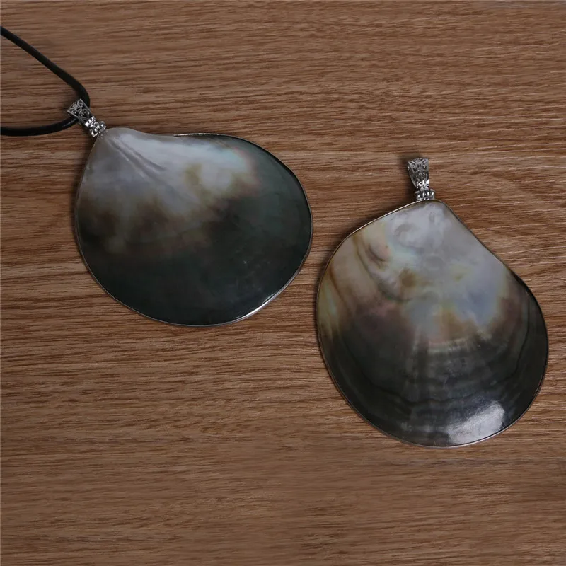 78x105mm Natural Round Mother of Pearl Black Shell Pendant Wrapping Belt Buckle For Jewelry Making DIY Jewelry Accessories
78x105mm Natural Round Mother of Pearl Black Shell Pendant Wrapping Belt Buckle For Jewelry Making DIY Jewelry Accessories