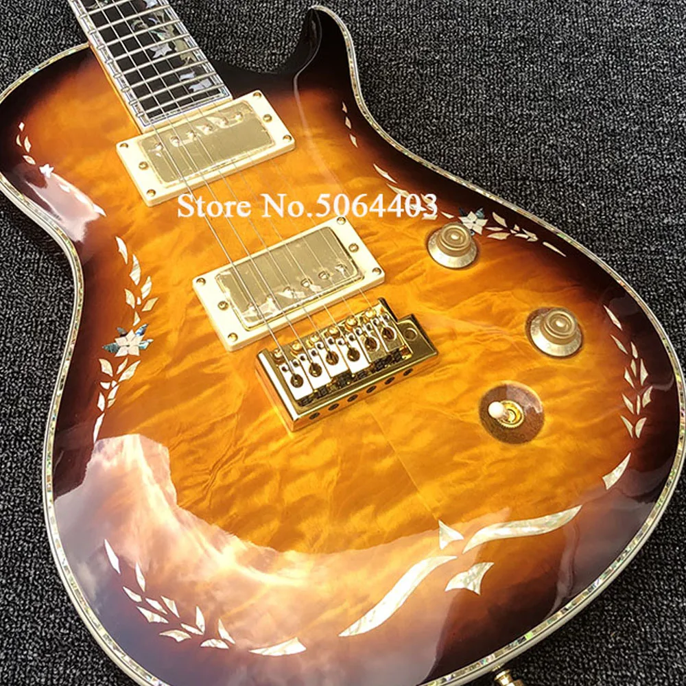 High quality 6 string electric guitar, body beck inlay, rosewood fingerboard shell inlay, peach blossom core wood, postage
High quality 6 string electric guitar, body beck inlay, rosewood fingerboard shell inlay, peach blossom core wood, postage