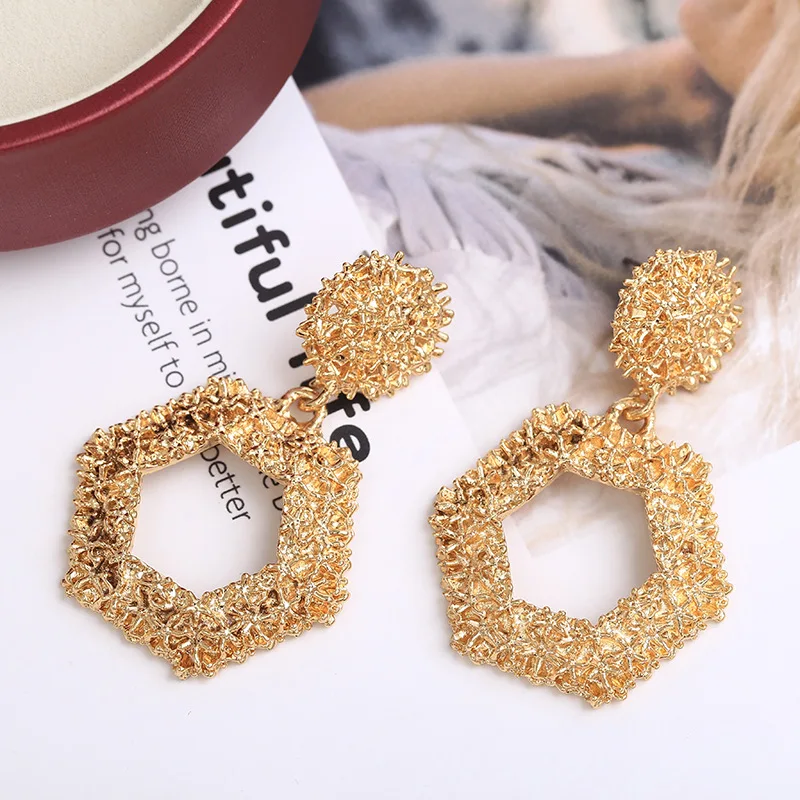 Women Bohemian Exaggerated Heavy Metal Earrings Simple Geometric Embossed Flower Jewelry Retro Fashion Personality Earrings
Women Bohemian Exaggerated Heavy Metal Earrings Simple Geometric Embossed Flower Jewelry Retro Fashion Personality Earrings