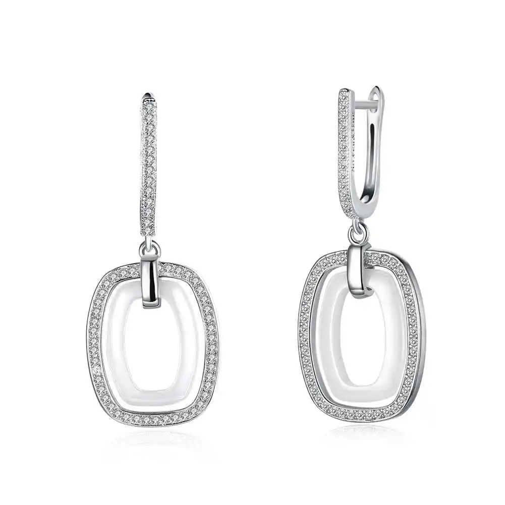 New Women 925 Sterling Silver Drop Earrings With White Rectangle Ceramic Vintage Brincos Zirconia Dangler Gift (EA101948)
New Women 925 Sterling Silver Drop Earrings With White Rectangle Ceramic Vintage Brincos Zirconia Dangler Gift (EA101948)