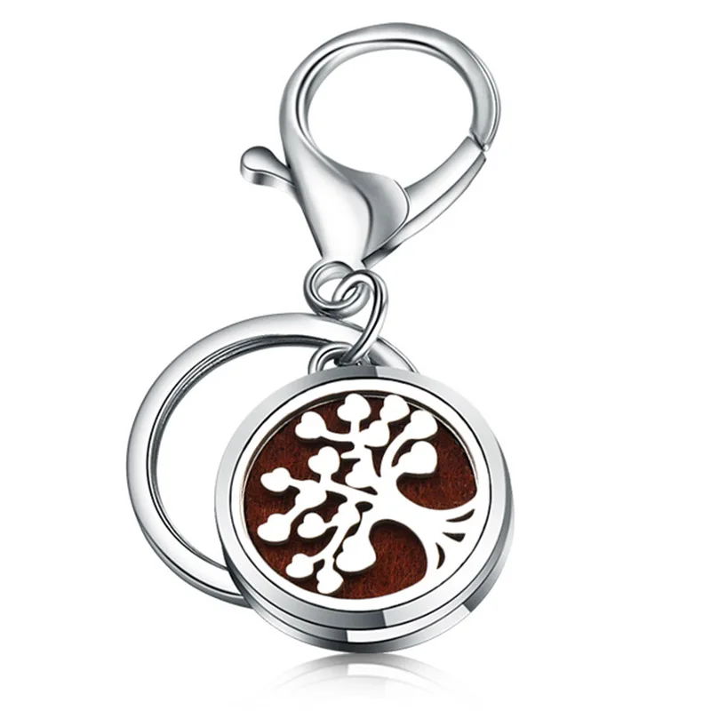 Charm High Quality Perfume Key Chain Tree Of Life Stainless Steel Essential Oil Diffuser Perfume Aromatherapy Locket Key Chain
Charm High Quality Perfume Key Chain Tree Of Life Stainless Steel Essential Oil Diffuser Perfume Aromatherapy Locket Key Chain