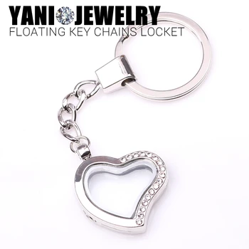 10pcs/lot Free shipping Heart Magnetic Floating Locket Keychains Key Ring Memory Glass Living Floating Locket With Rhinestones 
10pcs/lot Free shipping Heart Magnetic Floating Locket Keychains Key Ring Memory Glass Living Floating Locket With Rhinestones