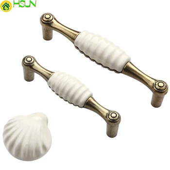 White Ceramic Pulls Handle Shell Knob Cupboard Knobs Kitchen Cabinet Handle Furniture Hardware
White Ceramic Pulls Handle Shell Knob Cupboard Knobs Kitchen Cabinet Handle Furniture Hardware