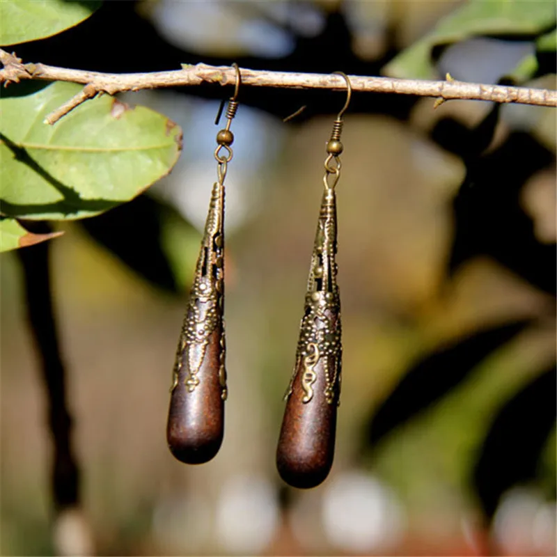 Graceful Exquisite Hollow Carved Charming Retro Brass Unique Quality Smooth Box wood Original Earrings Ethnic Style Jewelry 
Graceful Exquisite Hollow Carved Charming Retro Brass Unique Quality Smooth Box wood Original Earrings Ethnic Style Jewelry
