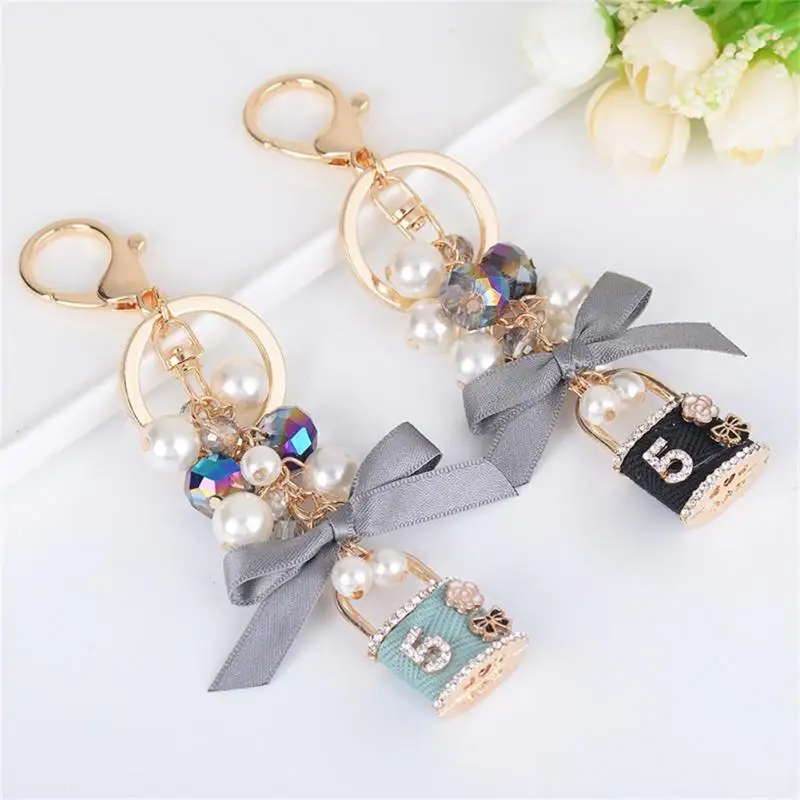 Unique Key Ring Rhinestones Decoration Bowknot Car Key Chain Number 5 Pattern Lock Pendant
Unique Key Ring Rhinestones Decoration Bowknot Car Key Chain Number 5 Pattern Lock Pendant