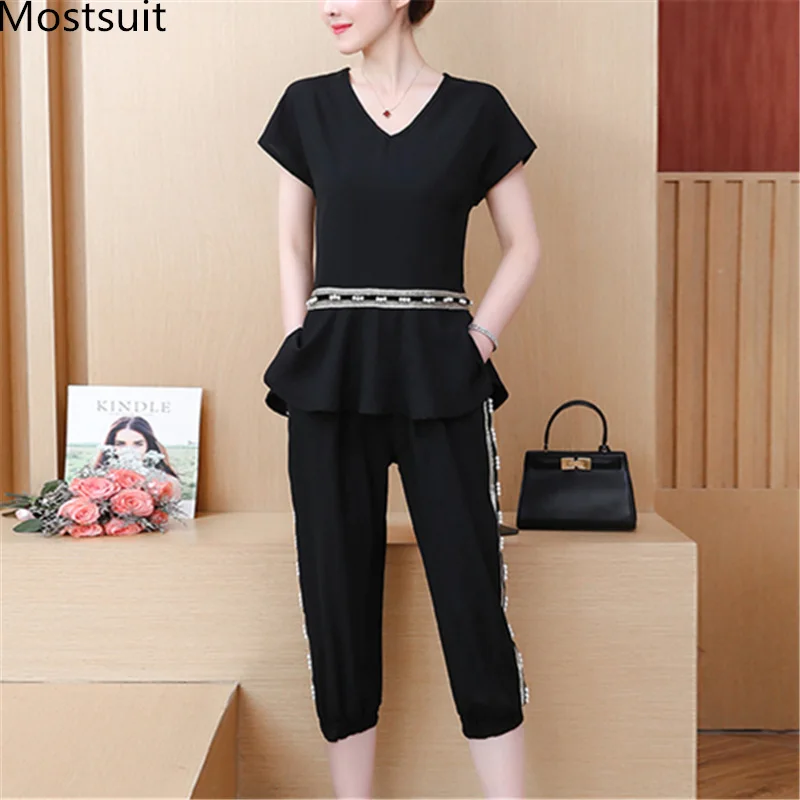 L-5xl Summer Black Beading Two Piece Sets Women Plus Size Short Sleeve Tops And Cropped Pants Suits Casual Elegant Korean Sets
L-5xl Summer Black Beading Two Piece Sets Women Plus Size Short Sleeve Tops And Cropped Pants Suits Casual Elegant Korean Sets