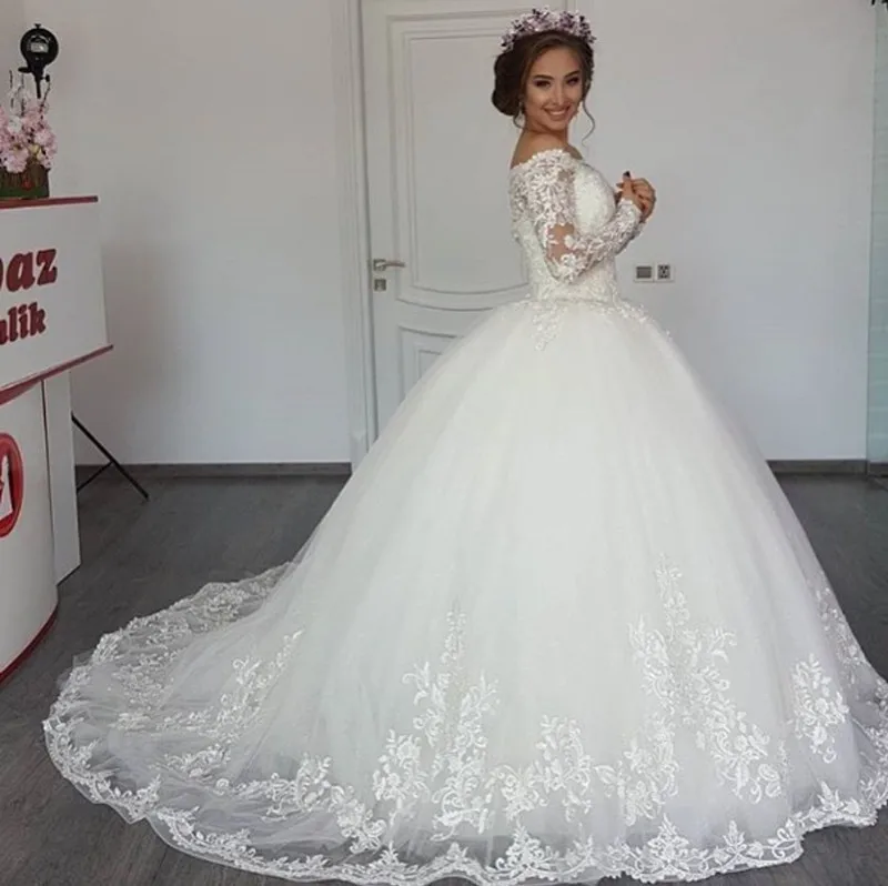 

Robe De Mariage 2018 Long Sleeve Wedding Dresses Sheer Tulle Back Sexy Bride Wedding Gowns Pearls Princess Vestido de Noiva 2019