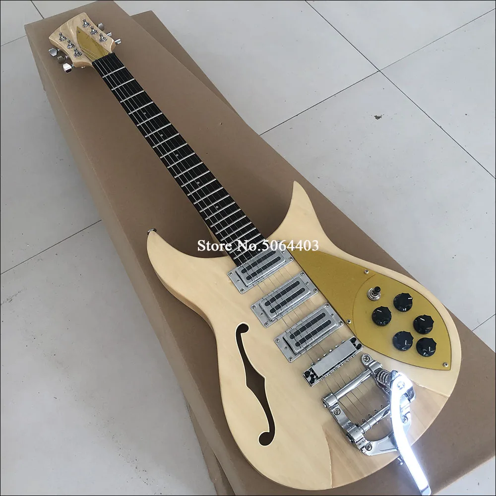 High quality 6 string electric guitar, log color, F hole guitar, half empty core electric guitar, rose wood fingerboard, postage
High quality 6 string electric guitar, log color, F hole guitar, half empty core electric guitar, rose wood fingerboard, postage