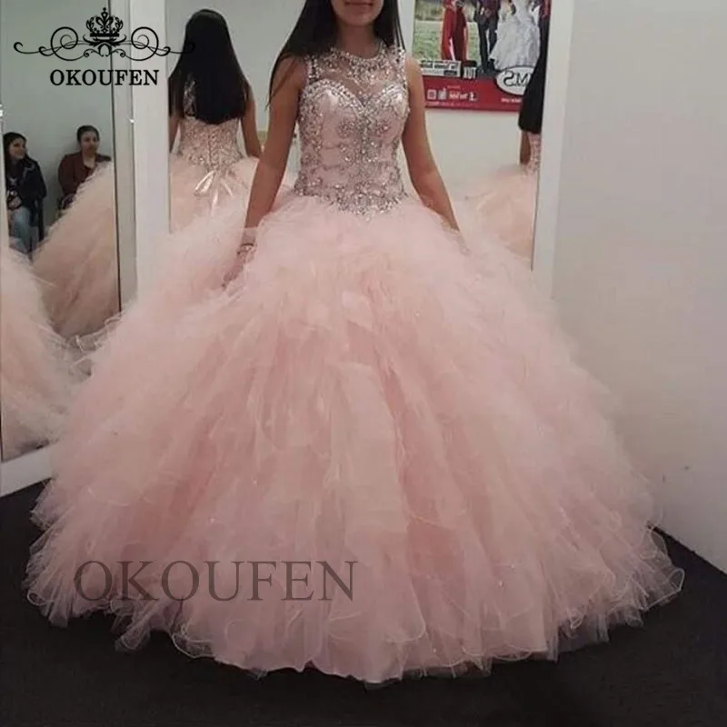 Light Pink Tulle Quinceanera Dresses 2019 Beads Crystal Tiered Cascading Ruffles Ball Gown Long Prom Dress Vestidos De 15 Anos
Light Pink Tulle Quinceanera Dresses 2019 Beads Crystal Tiered Cascading Ruffles Ball Gown Long Prom Dress Vestidos De 15 Anos