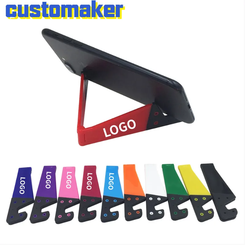 500 pcs/lot CUSTOMIZEDCreative v-shaped tabletop lounger stand ipad tablet phone universal folding v-shaped stand
500 pcs/lot CUSTOMIZEDCreative v-shaped tabletop lounger stand ipad tablet phone universal folding v-shaped stand
