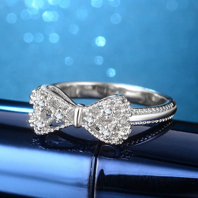 Silver Sparkling Bow Knot Ring Micro Pave Zircon Shining CZ Bow Romantic Rings for Women Christmas Gift Jewelry
Silver Sparkling Bow Knot Ring Micro Pave Zircon Shining CZ Bow Romantic Rings for Women Christmas Gift Jewelry