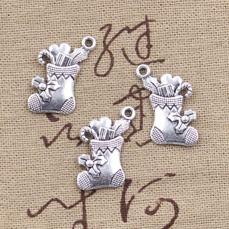 12pcs Charms Christmas Stocking 20x18mm Antique Silver Color Plated Pendants Making DIY Handmade Tibetan Finding Jewelry
12pcs Charms Christmas Stocking 20x18mm Antique Silver Color Plated Pendants Making DIY Handmade Tibetan Finding Jewelry
