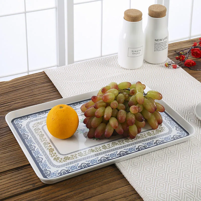 Pastoral style creative blue and white porcelain flower tray melamine household rectangular tray tea tray tableware fruit plate
Pastoral style creative blue and white porcelain flower tray melamine household rectangular tray tea tray tableware fruit plate