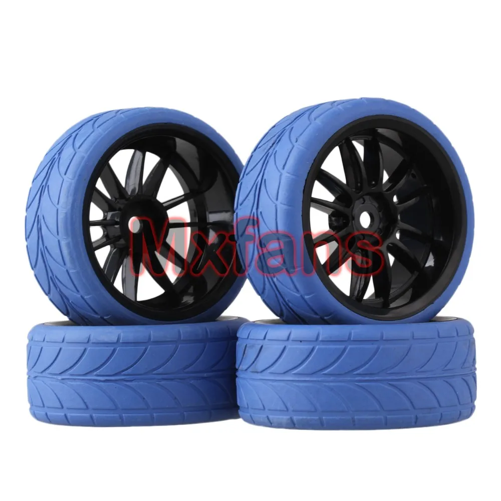 Mxfans 4x RC 1:10 On Road Car Black 12 Spoke Plastic Wheel Rim + Blue Arrow Rubber Tyre 
Mxfans 4x RC 1:10 On Road Car Black 12 Spoke Plastic Wheel Rim + Blue Arrow Rubber Tyre