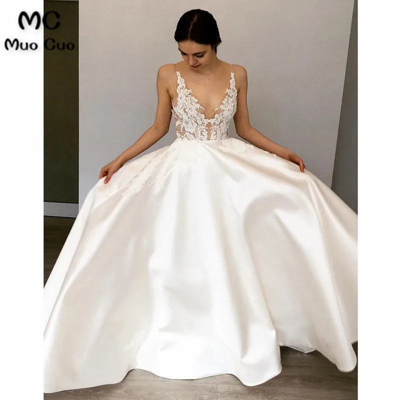 Illusion A-Line Wedding Dresses with Appliques Lace Bridal Dresses Satin Backless Sleeveless White Wedding Gown
Illusion A-Line Wedding Dresses with Appliques Lace Bridal Dresses Satin Backless Sleeveless White Wedding Gown
