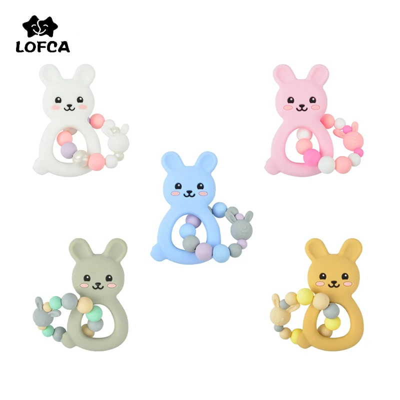 Детский Прорезыватель для зубов LOFCA, силиконовый браслет с мультяшным Кроликом, цепочка с зажимом для соски, силиконовая бусина, детская игрушка для прорезывания зубов, подарок для ухода
Детский Прорезыватель для зубов LOFCA, силиконовый браслет с мультяшным Кроликом, цепочка с зажимом для соски, силиконовая бусина, детская игрушка для прорезывания зубов, подарок для ухода