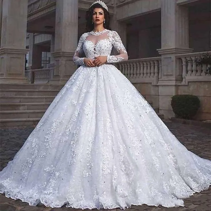 2019 Princess Sheer Ball Gown Wedding Dresses Long Sleeve Lace Appliques Beads Muslim Dubai Arabic Wedding Dresses bridal gowns
2019 Princess Sheer Ball Gown Wedding Dresses Long Sleeve Lace Appliques Beads Muslim Dubai Arabic Wedding Dresses bridal gowns