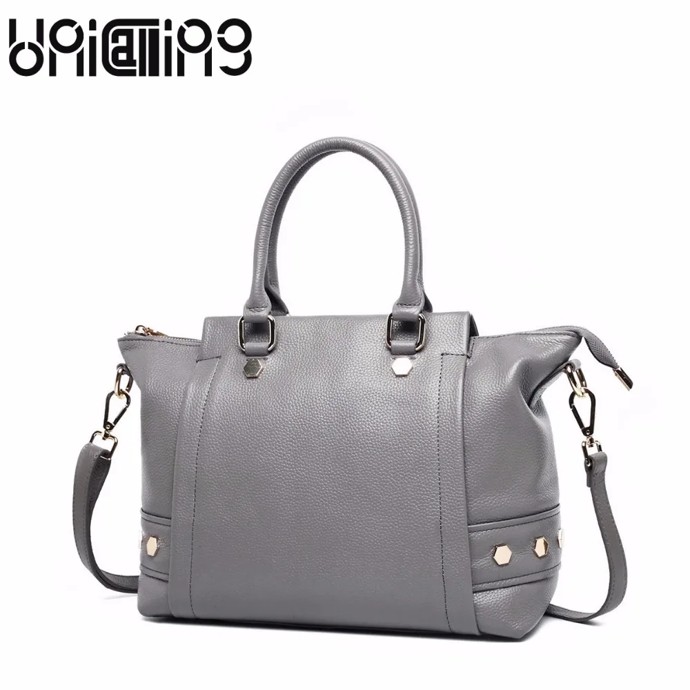 New style Trapeze bag fashion women bag Top grade solid color rivet Leisure mini genuine leather women handbag
New style Trapeze bag fashion women bag Top grade solid color rivet Leisure mini genuine leather women handbag