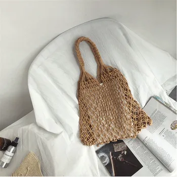 Cotton rope knitted hollow out single shoulder bag khaki color student bag large capacity beach bag fish net bag.
Cotton rope knitted hollow out single shoulder bag khaki color student bag large capacity beach bag fish net bag.