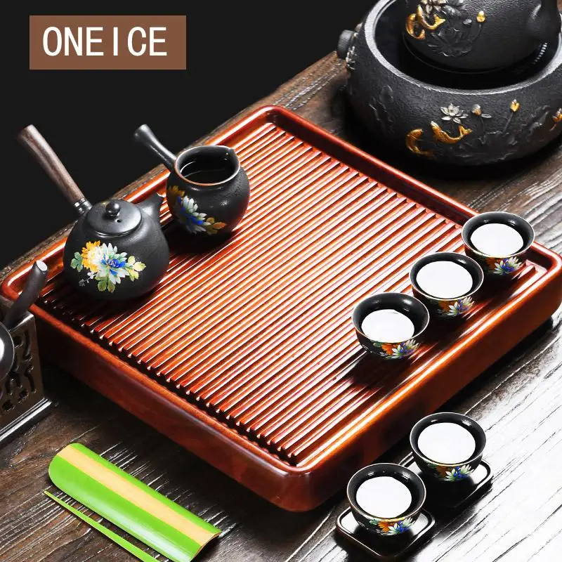 Rosewood Electric Wood Tea Tray Drainage Single-layer Table Kung Fu Set Home Simple Seat Sea Chinese Kung Fu Bamboo Tea Trays
Rosewood Electric Wood Tea Tray Drainage Single-layer Table Kung Fu Set Home Simple Seat Sea Chinese Kung Fu Bamboo Tea Trays