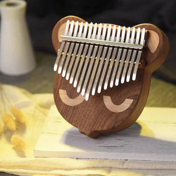 17 Lovely Key Thumb Piano Kalimba Whole Single Board Bear Face Black Walnut Mbira with Tuning Hammer
17 Lovely Key Thumb Piano Kalimba Whole Single Board Bear Face Black Walnut Mbira with Tuning Hammer