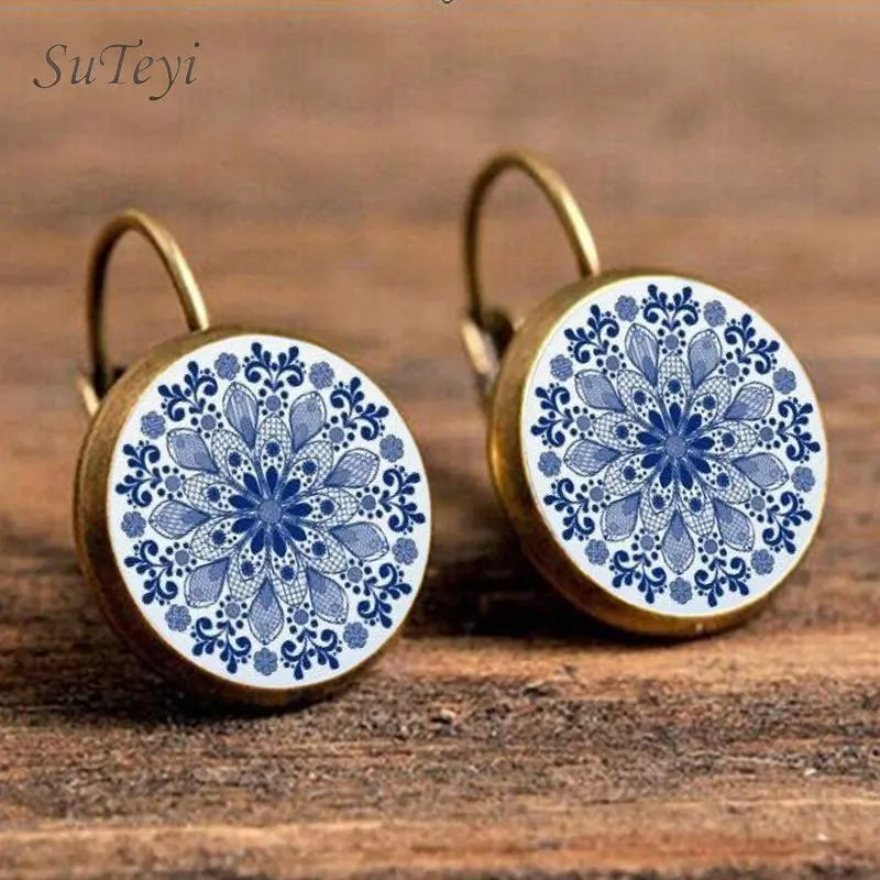SUTEYI Charm Blue Mandala Flower Earrings Henna Pendant Earring Yoga Om Symbol Zen Buddhism Crystal Glass Earrings For Jewellery
SUTEYI Charm Blue Mandala Flower Earrings Henna Pendant Earring Yoga Om Symbol Zen Buddhism Crystal Glass Earrings For Jewellery