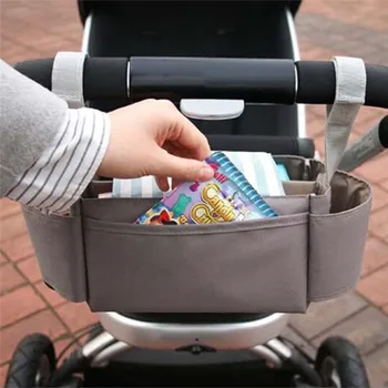 Universal Baby Trolley Storage Bag Stroller Cup Carriage Pram Buggy Organizer Mummy Bag Diaper Bagswholesale Dropshiping 
Universal Baby Trolley Storage Bag Stroller Cup Carriage Pram Buggy Organizer Mummy Bag Diaper Bagswholesale Dropshiping