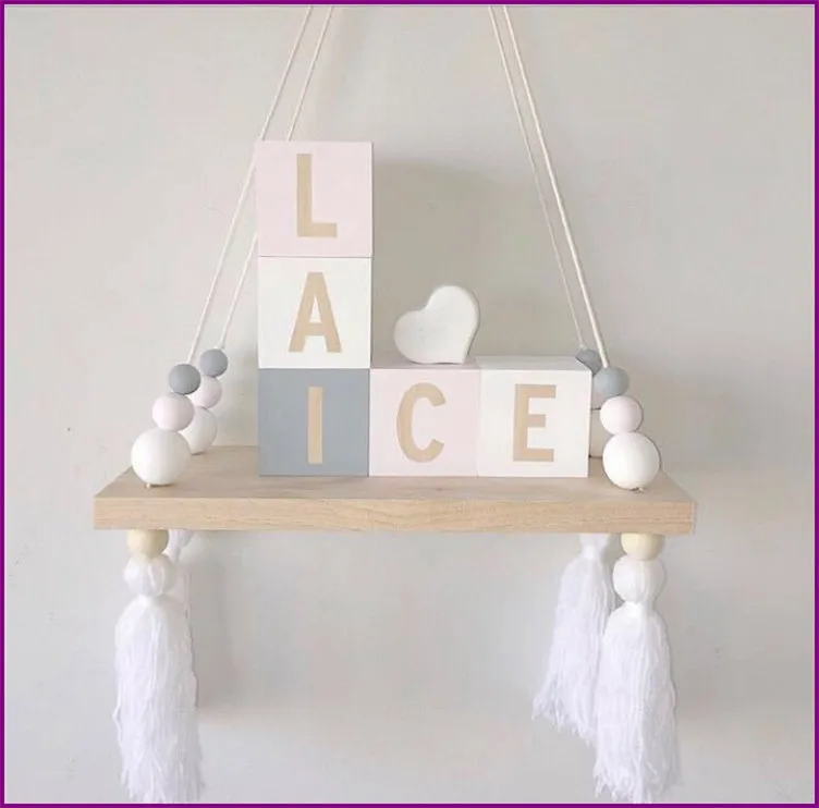Nordic style colorful wood beads shelves with tassel Wall clapboard decoration Children room kids clothing store display stand
Nordic style colorful wood beads shelves with tassel Wall clapboard decoration Children room kids clothing store display stand