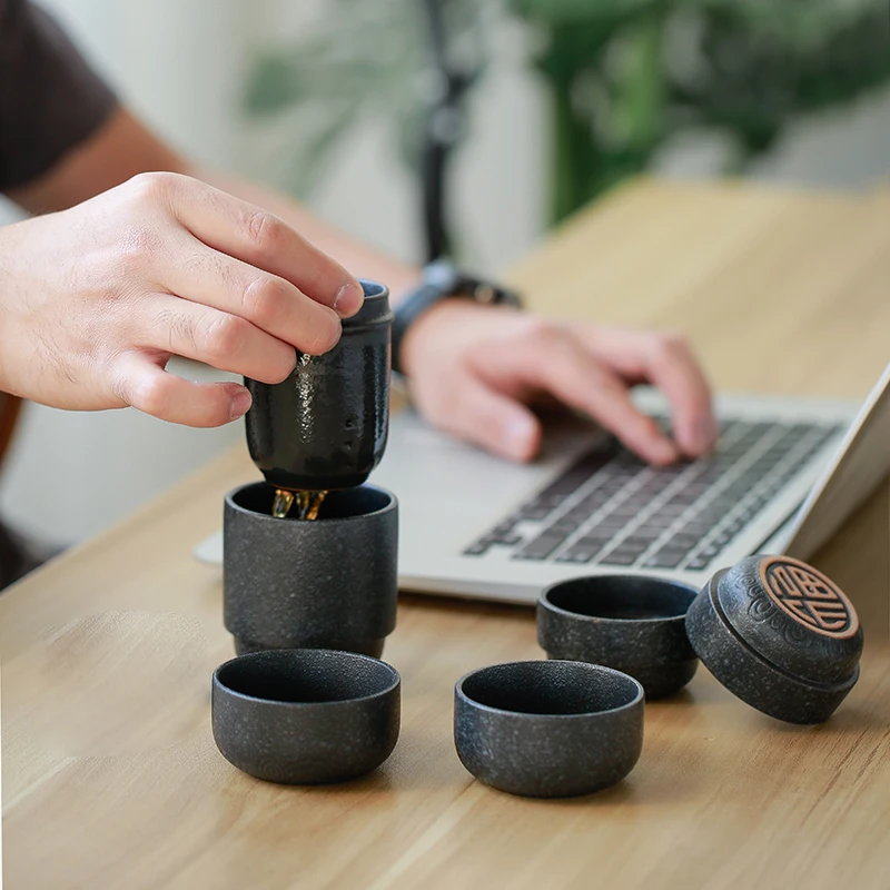 portable tea set for travel pottery tea pot filter cup porcelain tea cups blessing words on the bottom portable bag tea caddies
portable tea set for travel pottery tea pot filter cup porcelain tea cups blessing words on the bottom portable bag tea caddies