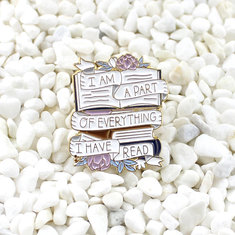 Open book Purple flower White ribbon Written with the words "I AM A PART OF EVERYTHING I HAVE READ" brooch Glamour pin
Open book Purple flower White ribbon Written with the words "I AM A PART OF EVERYTHING I HAVE READ" brooch Glamour pin