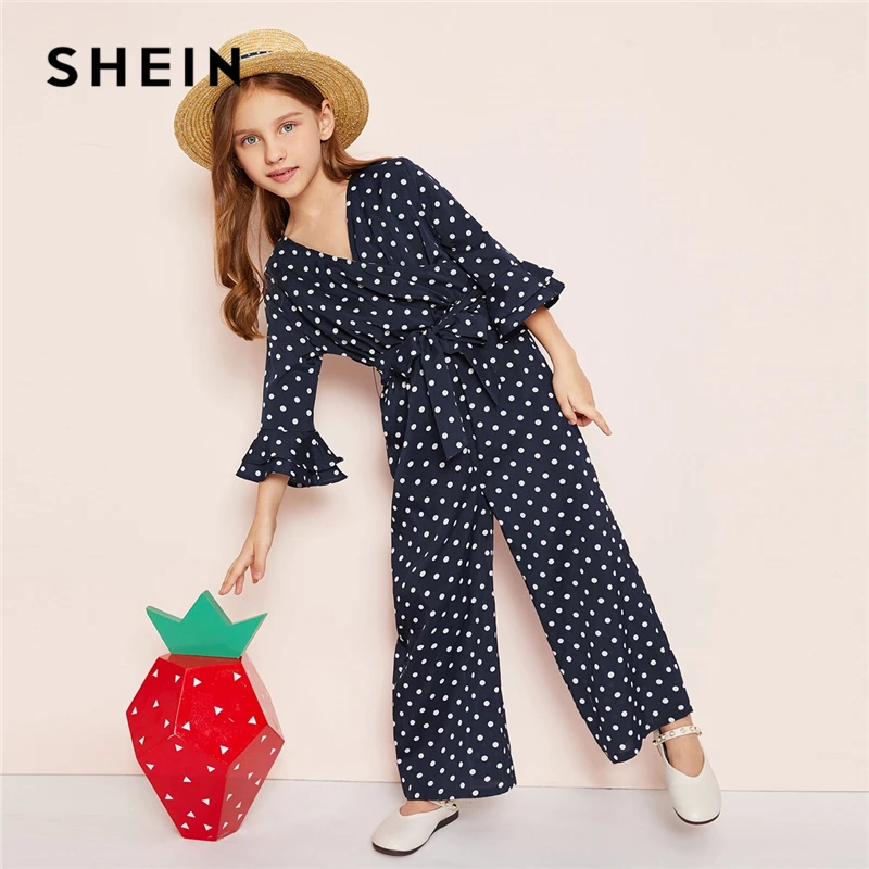 SHEIN Kiddie Girls Navy V Neck Polka Dot Wrap Front Belted Boho Jumpsuit 2019 Summer Tiered Layer Sleeve Wide Leg Kids Jumpsuits
SHEIN Kiddie Girls Navy V Neck Polka Dot Wrap Front Belted Boho Jumpsuit 2019 Summer Tiered Layer Sleeve Wide Leg Kids Jumpsuits