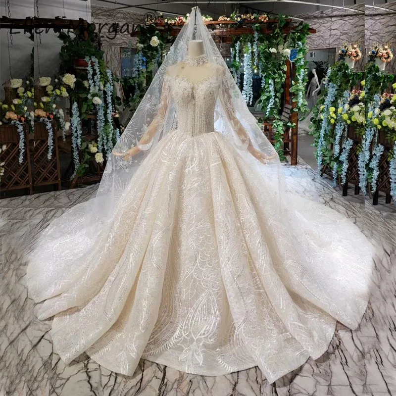 Luxury Vintage Long Sleeve Lace Wedding Dress Glitter Princess Ball Gowns 2019 High Neck Sequins With Veil Bridal Gown
Luxury Vintage Long Sleeve Lace Wedding Dress Glitter Princess Ball Gowns 2019 High Neck Sequins With Veil Bridal Gown