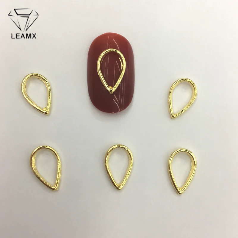 LEAMX 10 PCS/bag Alloy Nail Art Decorations Water Drop Shape Gems Gold 3D Frame Manicure DIY Nails Charms Tools NEW Decor L404
LEAMX 10 PCS/bag Alloy Nail Art Decorations Water Drop Shape Gems Gold 3D Frame Manicure DIY Nails Charms Tools NEW Decor L404