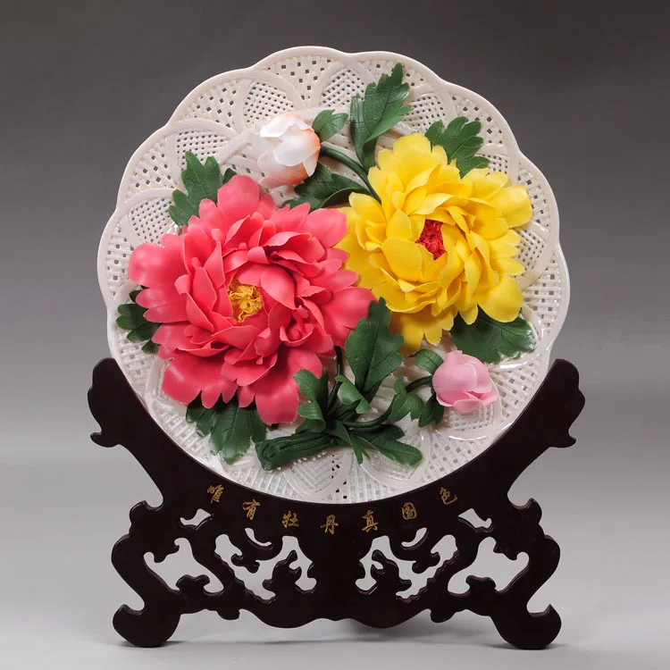 Auspicious peony porcelain ceramic disc hanging plate Home Furnishing gift hand hollow art Luoyang red ornaments
Auspicious peony porcelain ceramic disc hanging plate Home Furnishing gift hand hollow art Luoyang red ornaments