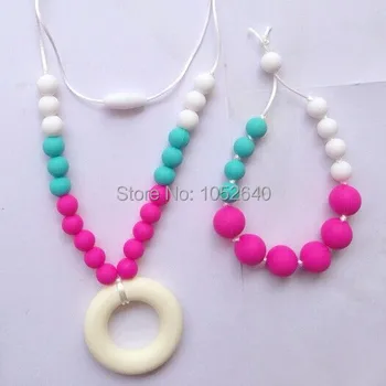 Silicone Teething Necklace for Mom / Nursing Necklace/ Babywearing Necklace and Bracelet Set / baby teether
Silicone Teething Necklace for Mom / Nursing Necklace/ Babywearing Necklace and Bracelet Set / baby teether