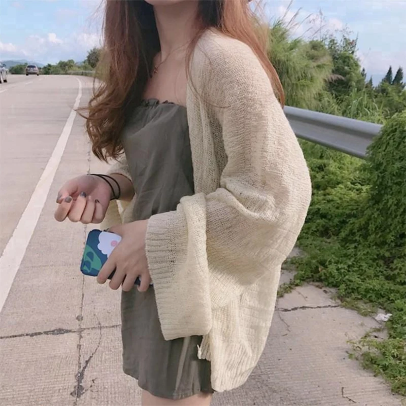 Knitted Cardigan women Summer cardigan Sweater women Loose Hollow coat Cardigans korean top
Knitted Cardigan women Summer cardigan Sweater women Loose Hollow coat Cardigans korean top