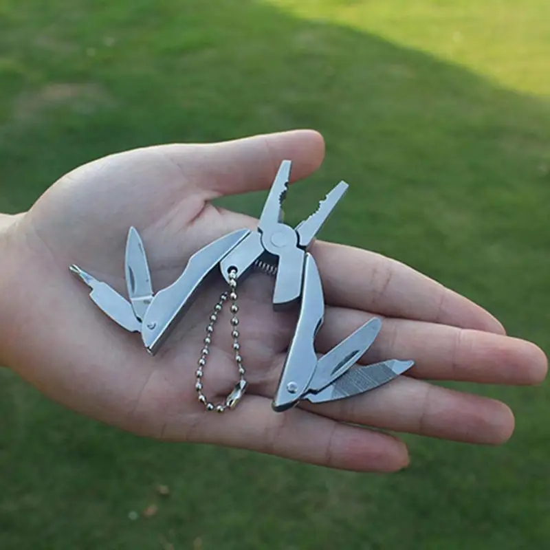 Multi Pocket Mini Folding Plier Portable Outdoor Hand Tools Wire Cutter Screwdriver Knife Saw Multifunction Survival Keychain
Multi Pocket Mini Folding Plier Portable Outdoor Hand Tools Wire Cutter Screwdriver Knife Saw Multifunction Survival Keychain