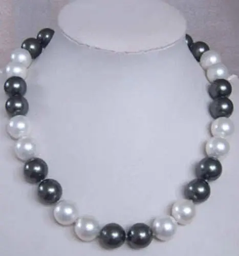 FREE shipping>>>>>12MM Elegant white black Shell Pearl Necklace 18'' 6.07
FREE shipping>>>>>12MM Elegant white black Shell Pearl Necklace 18'' 6.07