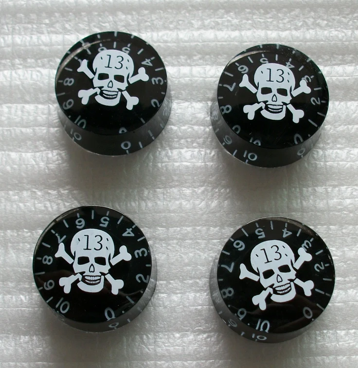 Sell Free Shipping guitar parts 4pcs/pack lp guitar knobs black guitar speed knobs skull V/T guitar control knobs
Sell Free Shipping guitar parts 4pcs/pack lp guitar knobs black guitar speed knobs skull V/T guitar control knobs
