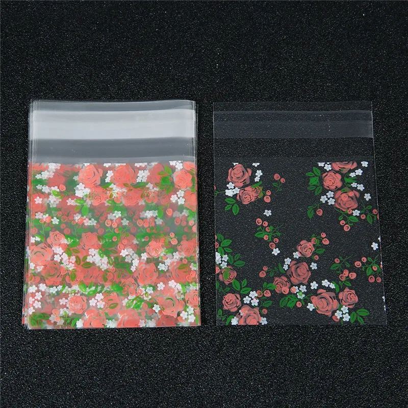 Фото 100pcs/lot Rose Flower Pattern Transparent Festive Gift Bags Cello Self-adhesive Cookie for Christmas Package | Украшения и