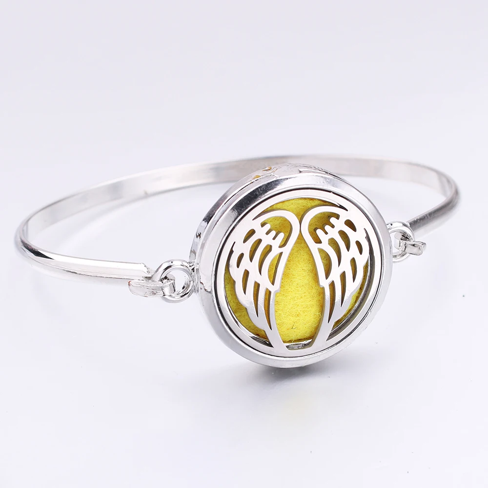 Floating Magnetic Angel Wing Aroma Essential Oil Diffuser Locket Bracelet Stainless Steel Bangle With 1pc Oil Diffuser Pad
Floating Magnetic Angel Wing Aroma Essential Oil Diffuser Locket Bracelet Stainless Steel Bangle With 1pc Oil Diffuser Pad
