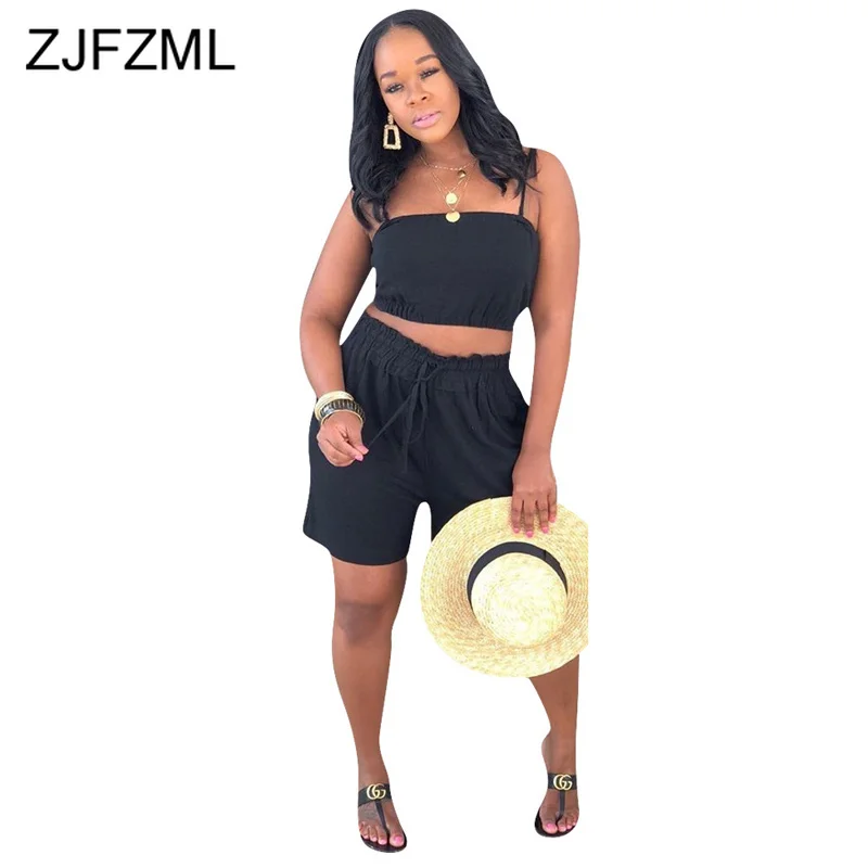 Sexy Black Two Piece Set Tracksuit Women Backless Spaghetti Strap Crop Tops + Causal Ruffles Shorts Suit Summer 2 Piece Outfit
Sexy Black Two Piece Set Tracksuit Women Backless Spaghetti Strap Crop Tops + Causal Ruffles Shorts Suit Summer 2 Piece Outfit