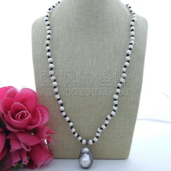 N101805 31" White Pearl Necklace White Keshi Trimmed With Marcasite Pendant
N101805 31" White Pearl Necklace White Keshi Trimmed With Marcasite Pendant