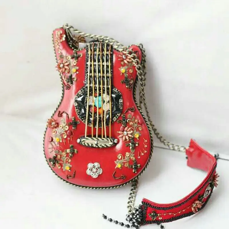 Musician's exclusive handmade guitar shaped chain cross body bag women's national style exquisite beading purse tassel handbag
Musician's exclusive handmade guitar shaped chain cross body bag women's national style exquisite beading purse tassel handbag